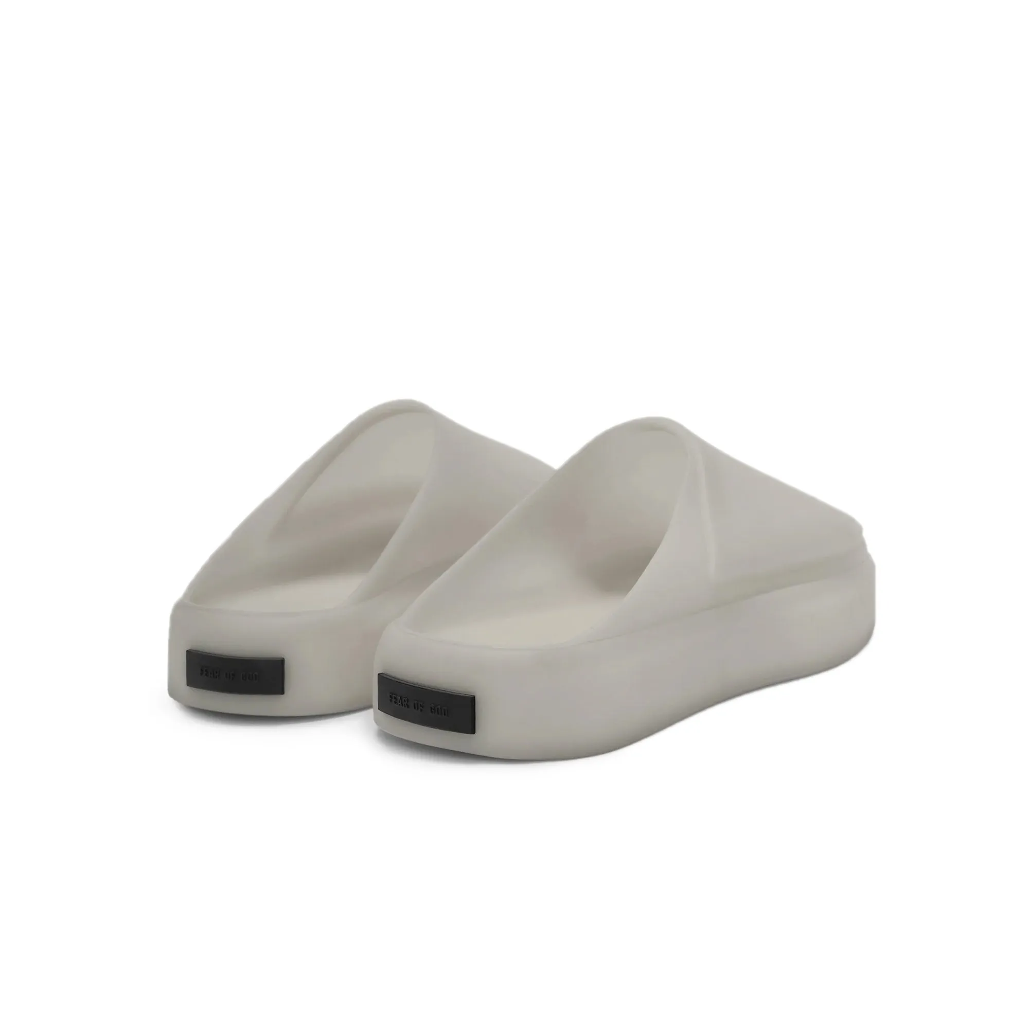 Fear of God Mens Los Feliz Rubber Slides running in a dock area shoes